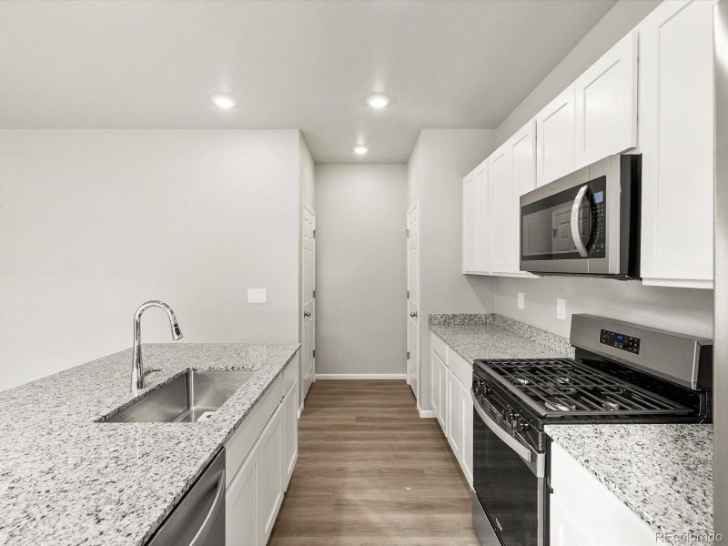 Furnished interior view inside a new home in Lake Bluff, Greeley (Image 7).