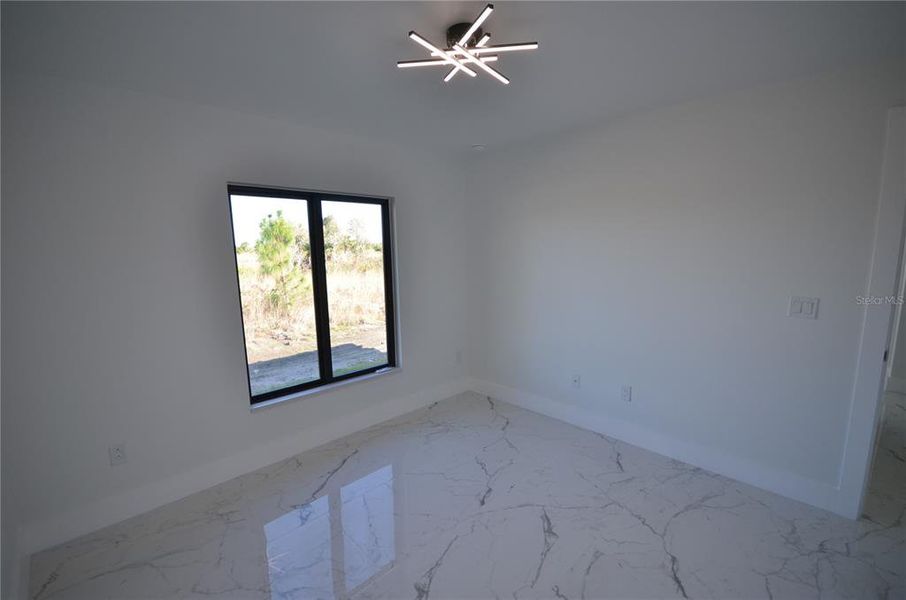 Spacious, unfurnished interior of a new home in , Lehigh Acres (Image 38).