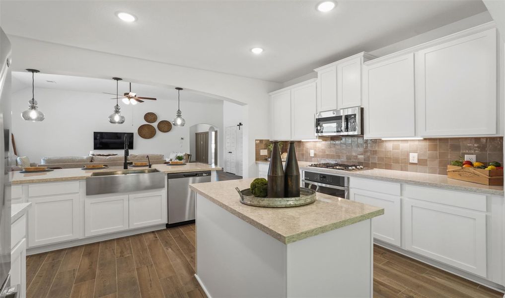 Stylish kitchen with dual islands (*Photo not of actual home and used for illustration purposes only.)