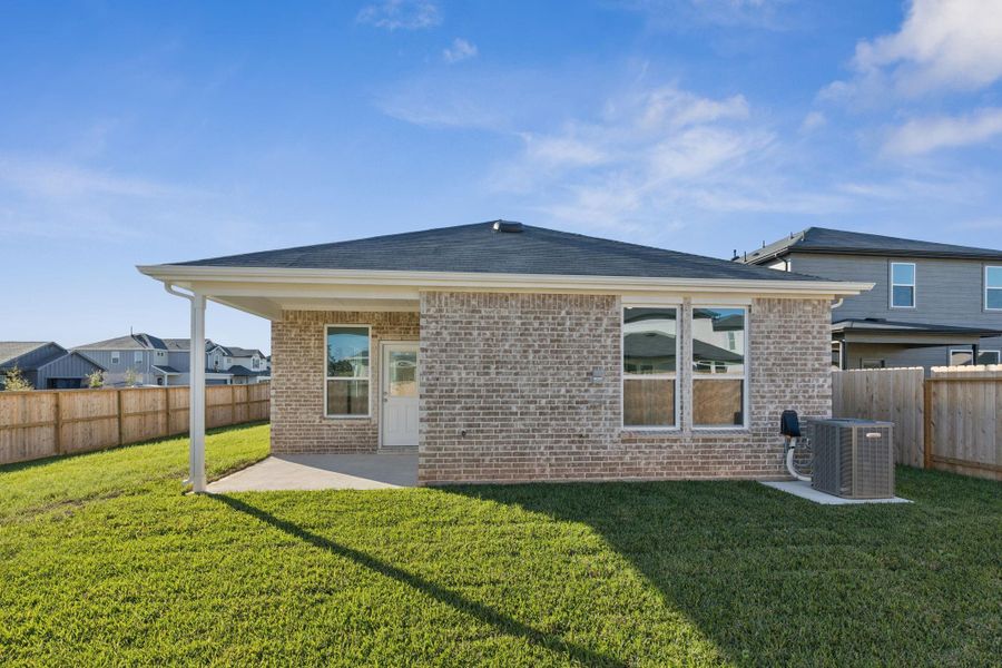 Exterior details and patio area of a home in Montgomery Bend, Montgomery (Image 3).