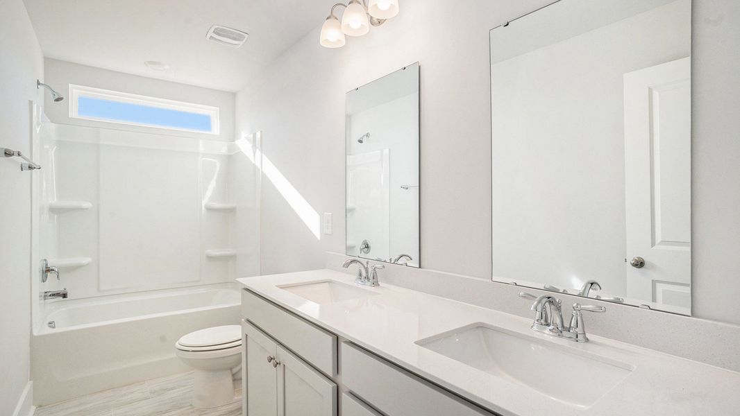 Furnished interior view inside a new home in Coastal Farms, Conway (Image 8).