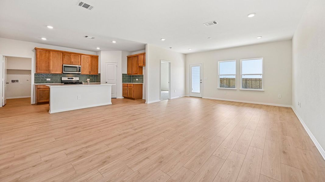Spacious, unfurnished interior of a new home in Carillon, Manor (Image 18).