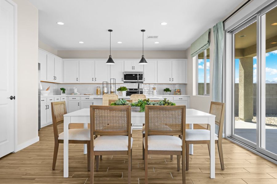 Dining Room & Kitchen | Skyline Floorplan | Elara at Moonlight | New Homes in Maricopa, AZ by Landsea Homes