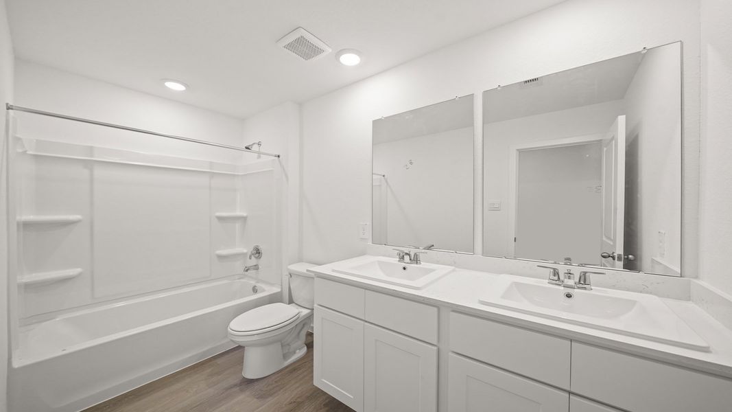 Furnished interior view inside a new home in Westward Pointe, Sealy (Image 10).