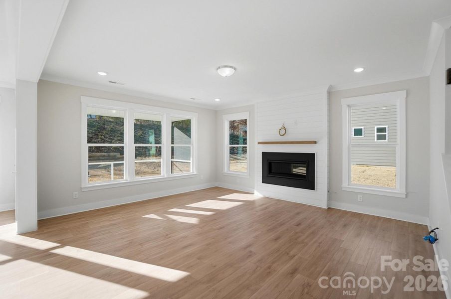 Family room with Cosmo fireplace and shiplap feature wall