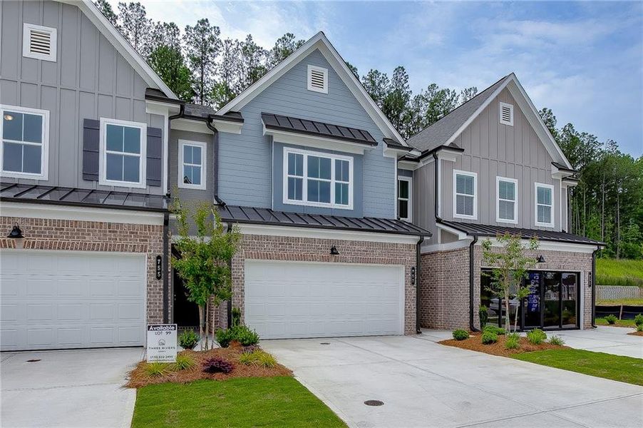 Front exterior of a new home in , Sugar Hill, GA, highlighting curb appeal (Image 24).