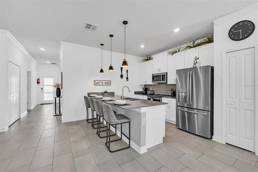 Furnished interior view inside a new home in , Kissimmee (Image 35).
