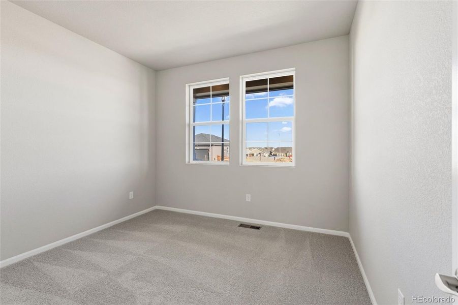 Spacious, unfurnished interior of a new home in Talon Pointe, Thornton (Image 26).