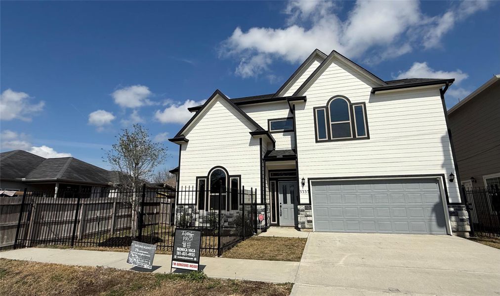 Front exterior of a new home in , Houston, TX, highlighting curb appeal (Image 16).