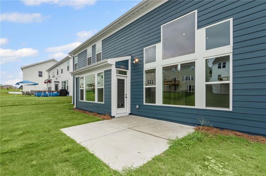 Front exterior of a new home in Twin Lakes, Hoschton, GA, highlighting curb appeal (Image 22).