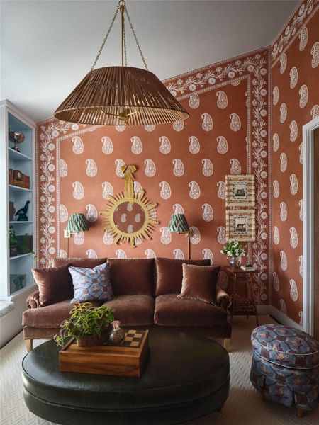 Leah O’Connell designed the den, where a Texas bandana becomes art — reimagined as a textured, architectural wallcovering that sets a tone both familiar and refined.