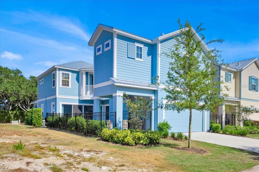 Front exterior of a new home in , Reunion, FL, highlighting curb appeal (Image 19).