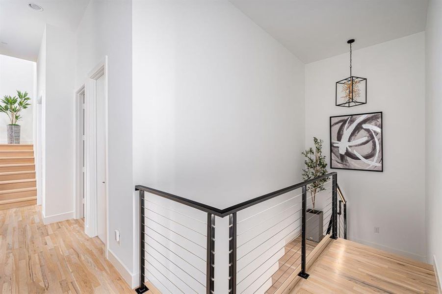 Corridor featuring light hardwood / wood-style floors