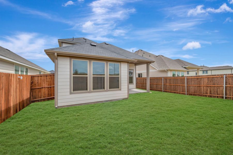 Exterior details and patio area of a home in The Meadows, Denton (Image 21).