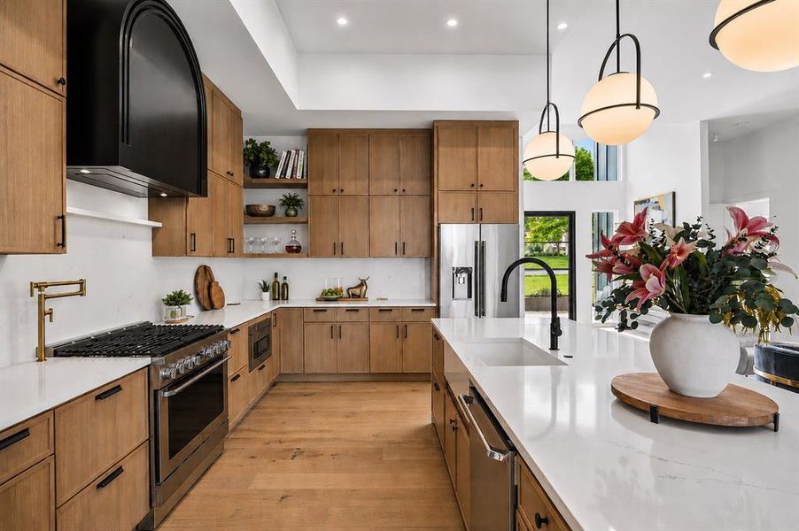 Electrolux range and dishwasher ground the kitchen in function and beauty, in the center of activity of the home.
