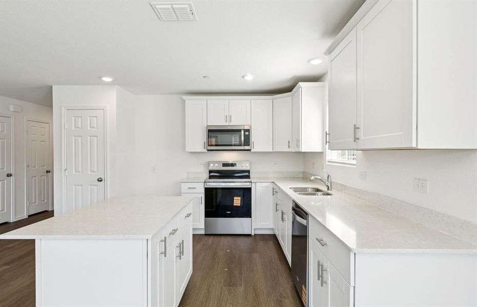 Nice island overlooking gathering room and dining areas Nice island overlooking gathering room and dining areas