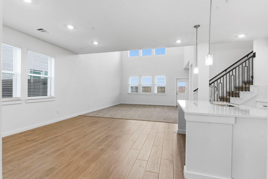 Spacious, unfurnished interior of a new home in , Iowa Colony (Image 32).