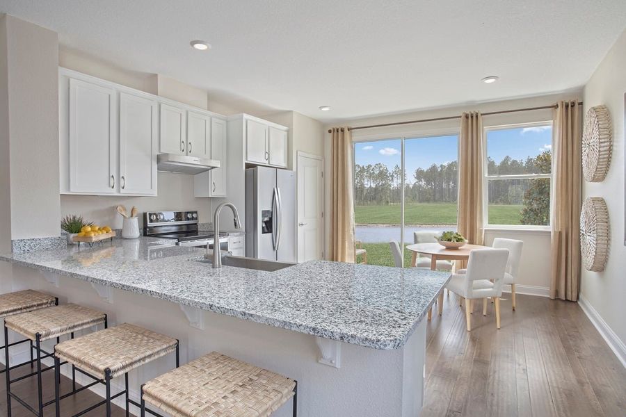 Representative furnished interior of a home built from the 1342 by KB Home in Haden Woods, Jacksonville (Image 4).