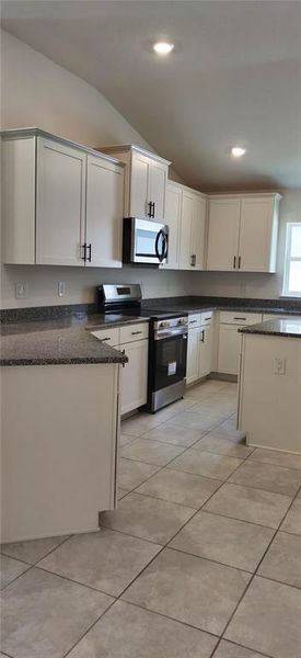 Furnished interior view inside a new home in Sunset Landing, Spring Hill (Image 5).
