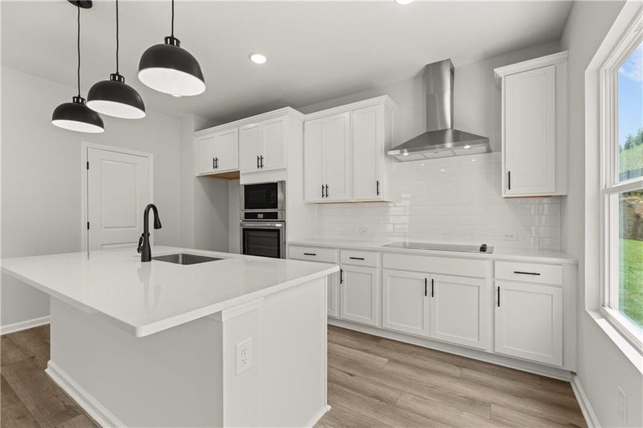 Furnished interior view inside a new home in The Bluffs, Canton (Image 9).