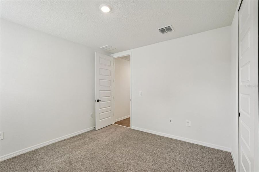 Spacious, unfurnished interior of a new home in Oakfield Trails - Signature Series, Parrish (Image 40).