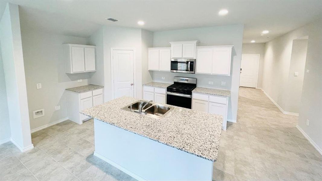 Kitchen - All Home and community information, including pricing, included features, terms, availability and amenities, are subject to change at any time without notice or obligation. All Drawings, pictures, photographs, video, square footages, floor plans, elevations, features, colors and sizes are approximate for illustration purposes only and will vary from the homes as built.