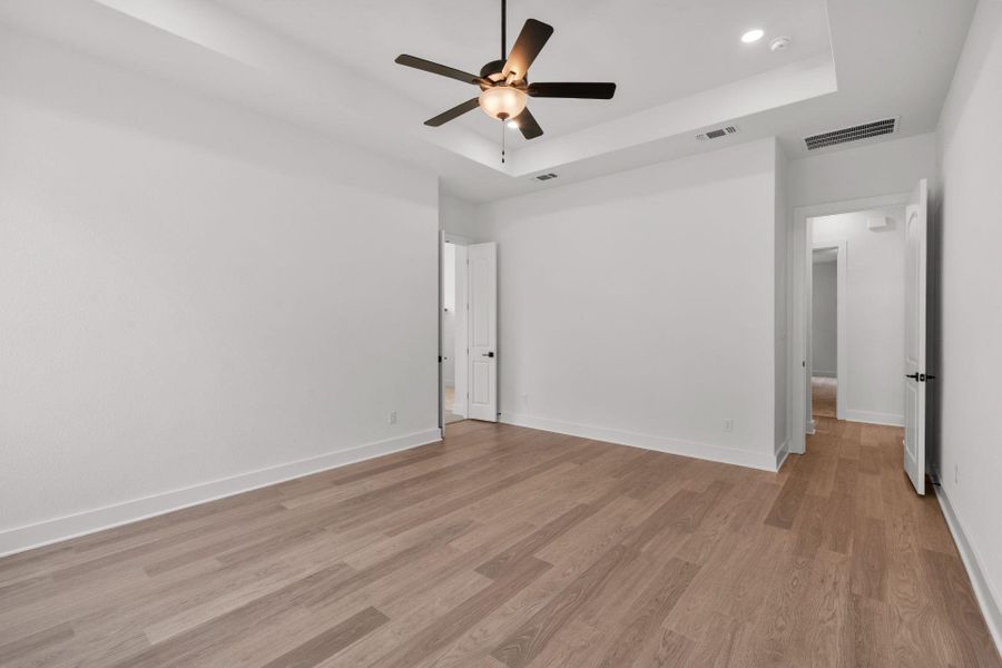 Primary Bedroom with tray ceiling