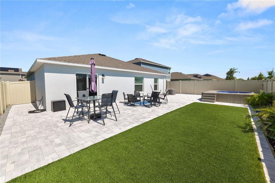 Exterior details and patio area of a home in Hunt Club Groves, Lake Wales (Image 4).