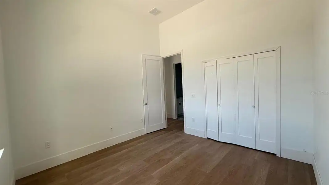 Spacious, unfurnished interior of a new home in , Port Charlotte (Image 9).