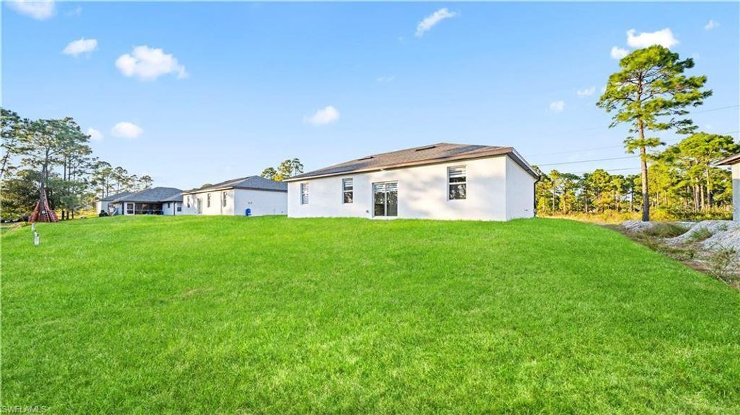Exterior details and patio area of a home in , Lehigh Acres (Image 27).
