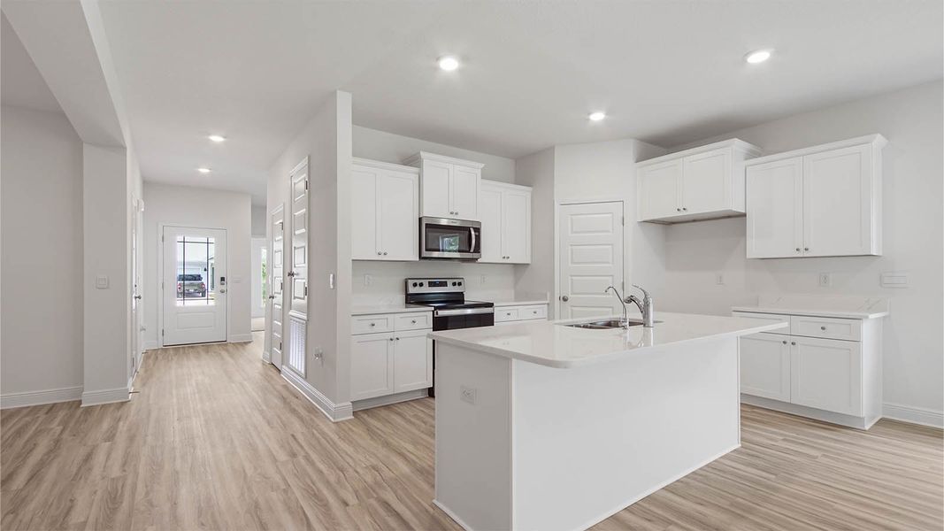 Representative furnished interior of a home built from the Kennedy by D.R. Horton in Bayside at Ward Creek, Panama City Beach (Image 10).
