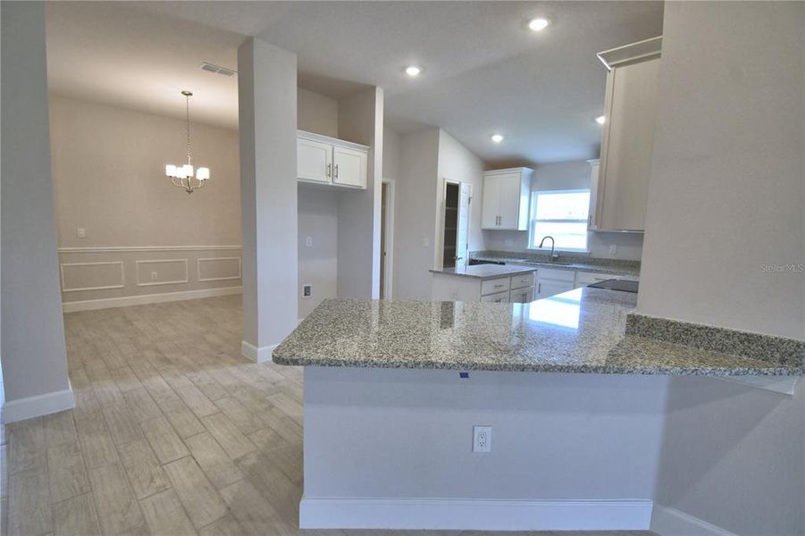 Furnished interior view inside a new home in Cadence Crossing, Auburndale (Image 7). Furnished interior view inside a new home in Cadence Crossing, Auburndale (Image 7).