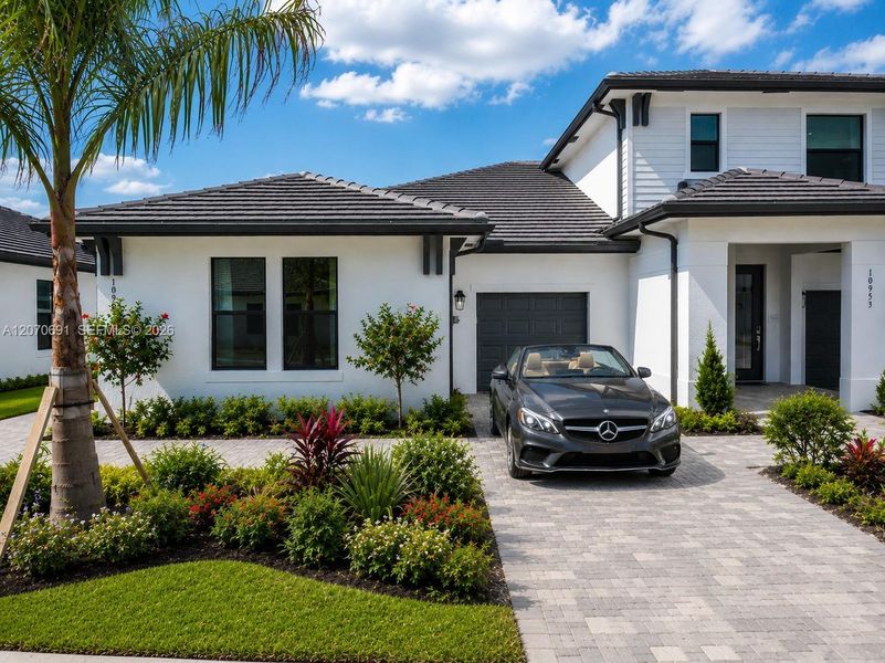 Front exterior of a new home in , Fort Myers, FL, highlighting curb appeal (Image 2). Front exterior of a new home in , Fort Myers, FL, highlighting curb appeal (Image 2).