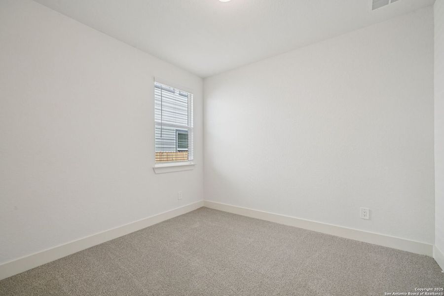 Spacious, unfurnished interior of a new home in Estancia Ranch - Premier Series, San Antonio (Image 15).