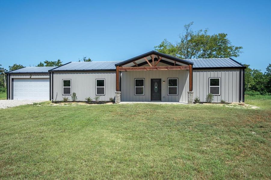 Front exterior of a new home in , Canton, TX, highlighting curb appeal (Image 1). Front exterior of a new home in , Canton, TX, highlighting curb appeal (Image 1).