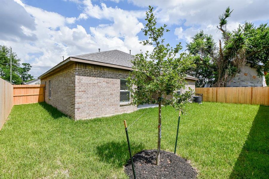 Exterior details and patio area of a home in , Houston (Image 3).