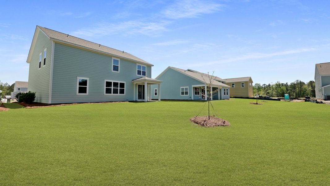 Front exterior of a new home in Sheep Island, Summerville, SC, highlighting curb appeal (Image 22).