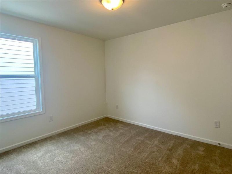 Spacious, unfurnished interior of a new home in Eastlyn Crossing, Flowery Branch (Image 27). Spacious, unfurnished interior of a new home in Eastlyn Crossing, Flowery Branch (Image 27).