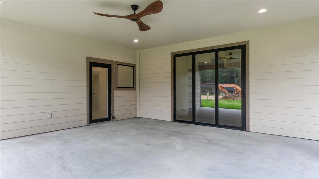 Exterior details and patio area of a home in , Conroe (Image 19).