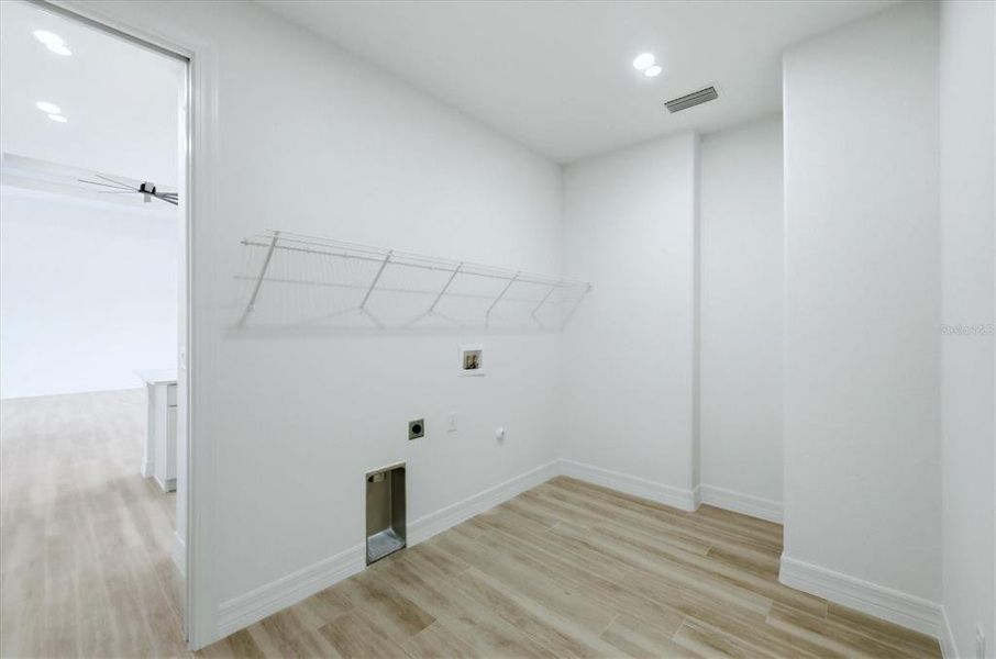 Spacious, unfurnished interior of a new home in , Port Charlotte (Image 30).