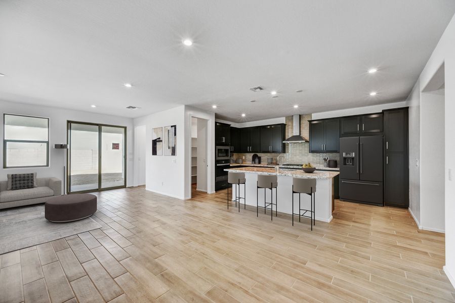 Furnished interior view inside a new home in Marbella at Windrose, Waddell (Image 9).