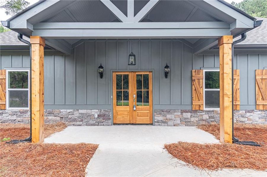Front exterior of a new home in , Braselton, GA, highlighting curb appeal (Image 24).