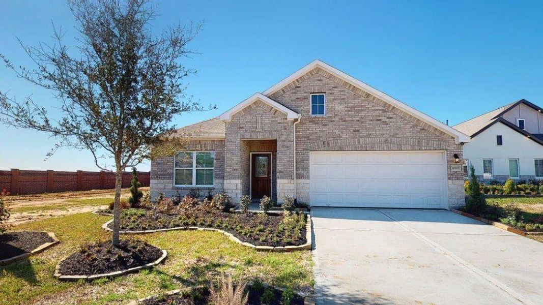 Front exterior of a new home in Enclave at Willis, Willis, TX, highlighting curb appeal (Image 1). Front exterior of a new home in Enclave at Willis, Willis, TX, highlighting curb appeal (Image 1).