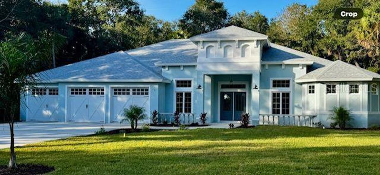 Front exterior of a new home in , Flagler Beach, FL, highlighting curb appeal (Image 19). Front exterior of a new home in , Flagler Beach, FL, highlighting curb appeal (Image 19).