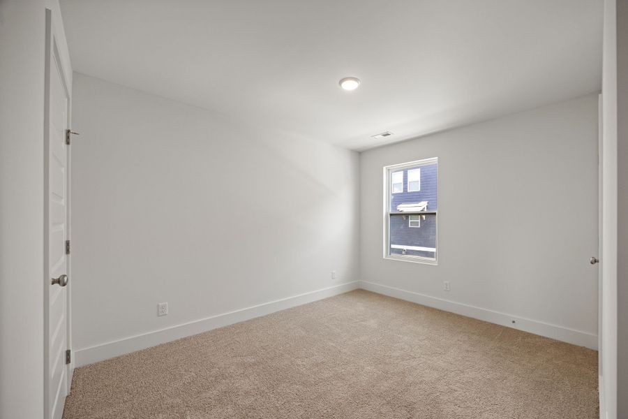 Comfortable Guest Bedroom or Flexible Home Office Space