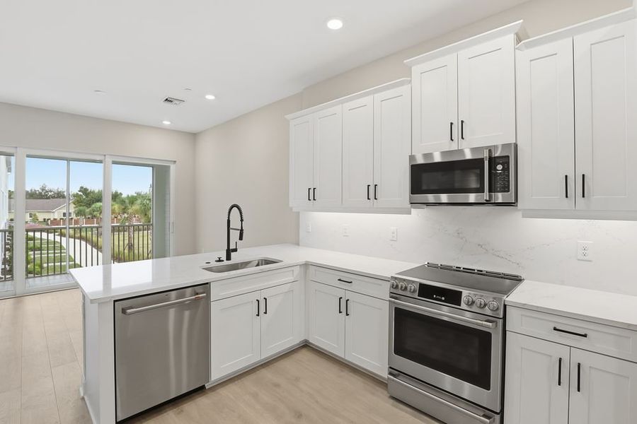 Furnished interior view inside a new home in Seahaven, Punta Gorda (Image 11).