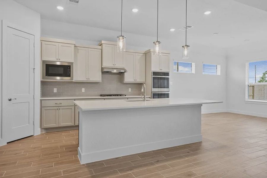 Representative furnished interior of a home built from the Brooks by Chesmar Homes in Grange, Katy (Image 8).