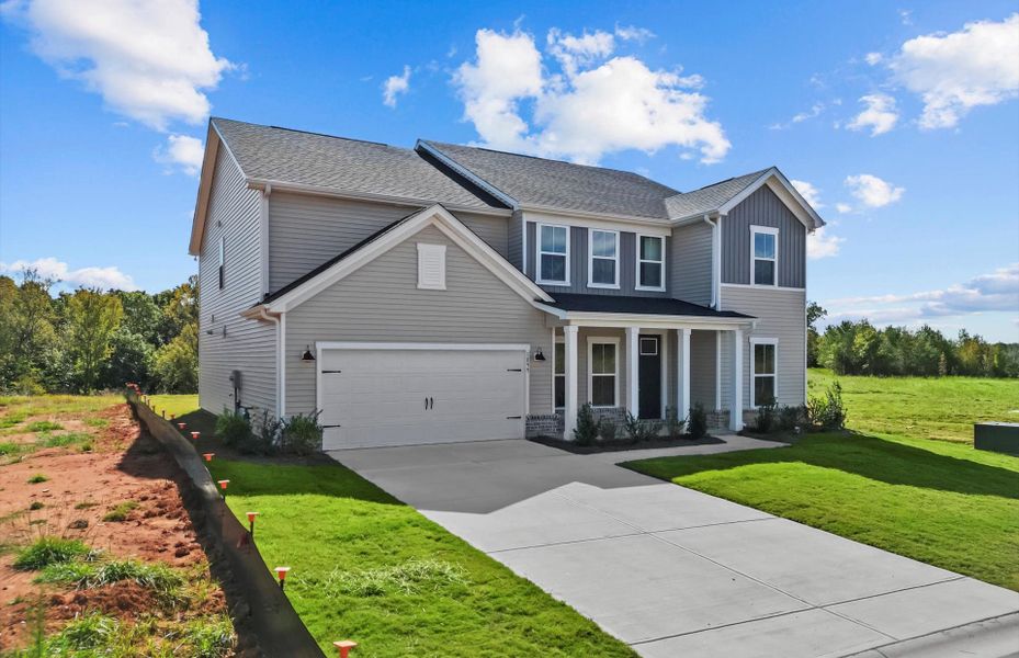 Front exterior of a new home in Sweetwater Hills, Moore, SC, highlighting curb appeal (Image 18).