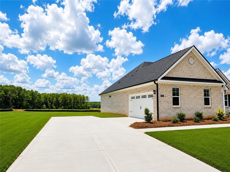 Front exterior of a new home in Westland, Bogart, GA, highlighting curb appeal (Image 2).