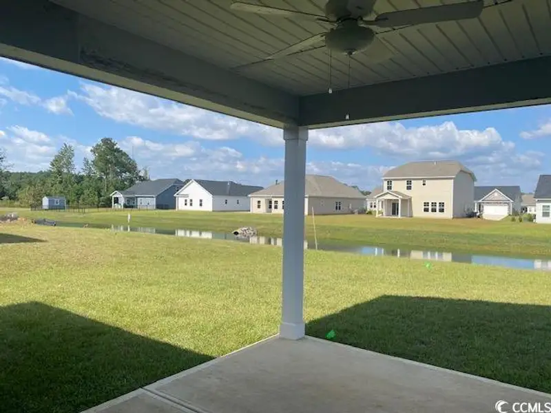 Exterior details and patio area of a home in Oak Hollow, Longs (Image 2).